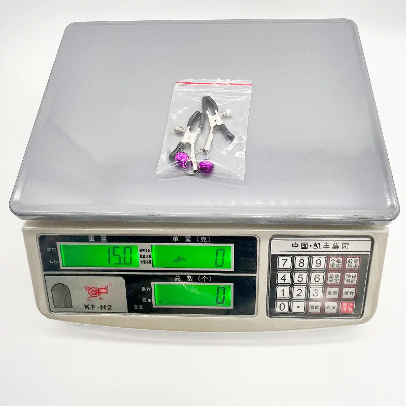 Couples Teasing Nipple Clamps